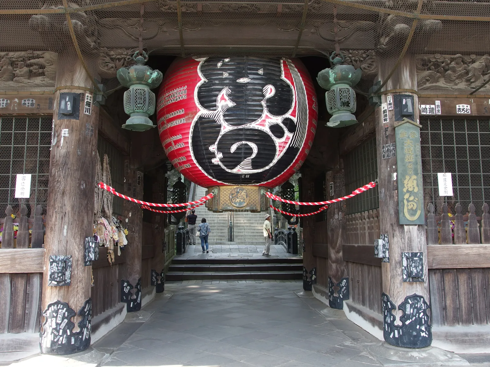 Giant red lantern hanging in a gate at Naritasan Shinshoji Temple